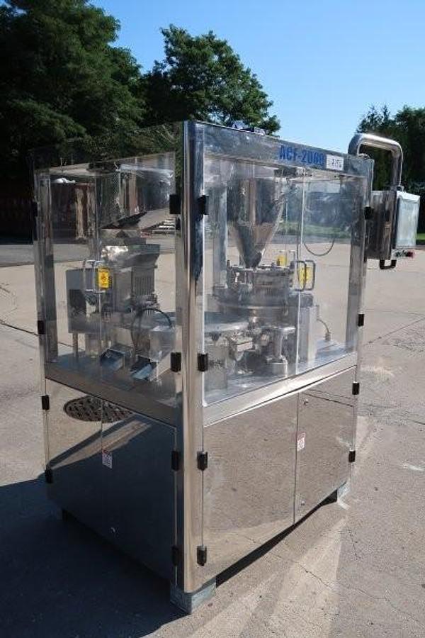 Used Tradamax Equipment and Supply Automatic capsule Filling Machine, 11 Station