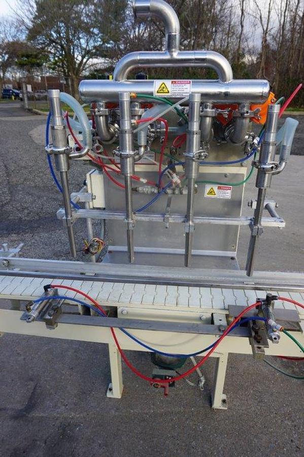 Used PackWest 4 Piston Straight Line Filling Machine, 32 Ounce Pistons