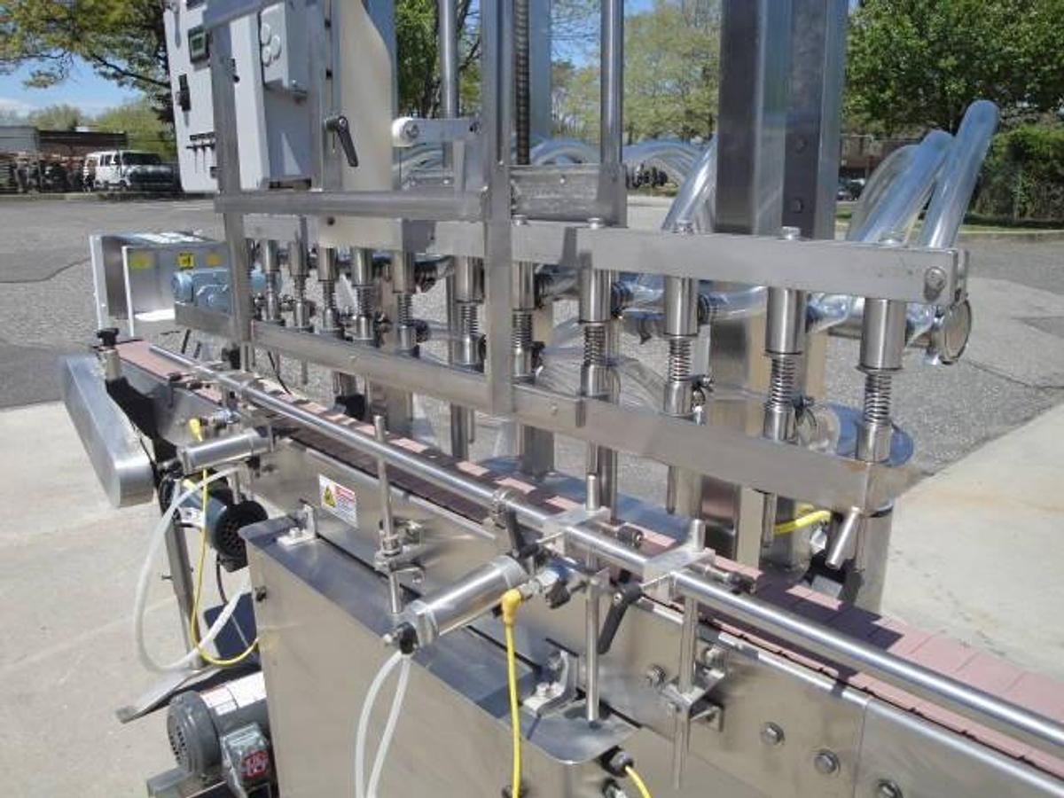 Used Packaging Dynamics Twelve Spout Stainless Automatic Liquid Filler
