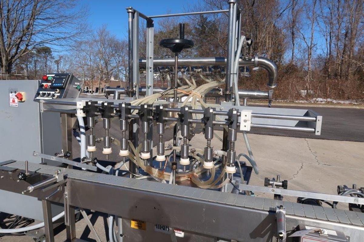 Used MRM/Elgin 8-Head Straightline Overflow Filling Machine