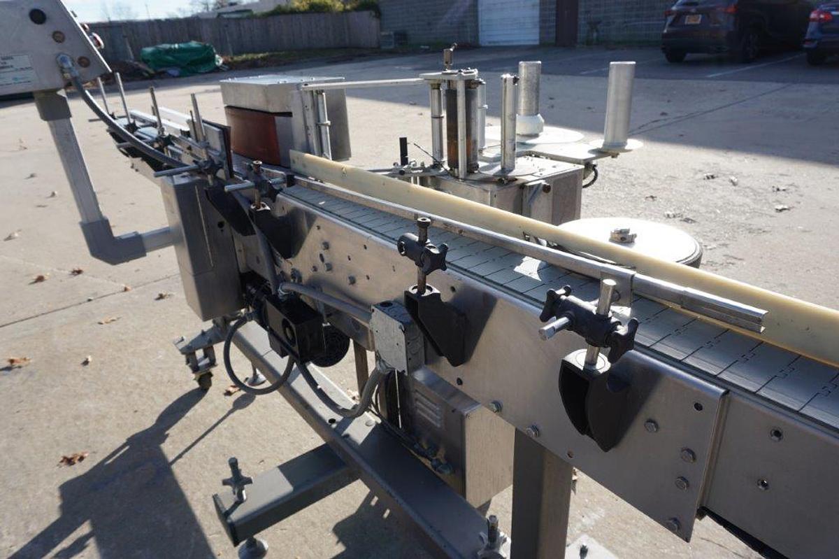 Used NJM  Auto Colt II Pressure Sensitive Spot/Wrap Around Labeling Machine