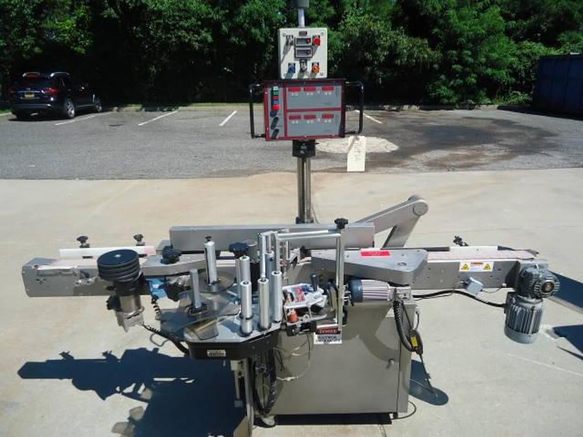 Used Harland “Sirius” Spot/Wrap Around Labeler With Coder