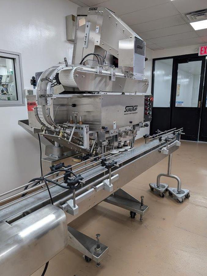 Used Surekap SK6000 Six Spindle Capper, Pharma Use