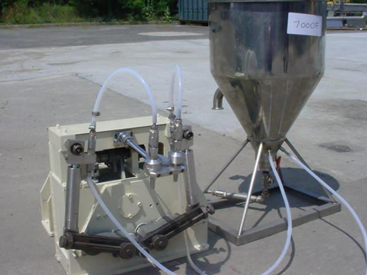 Used Two Spout Tabletop Piston Filler With Hopper