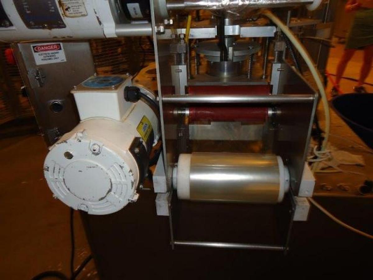 Used World Cup Rotary Cup Filling/Sealing Machine, 40 Per Minute