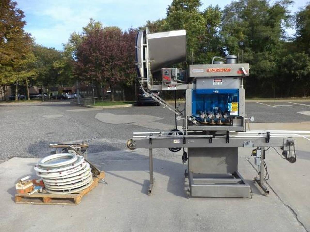 Used Pack West eight spindle inline automatic capper