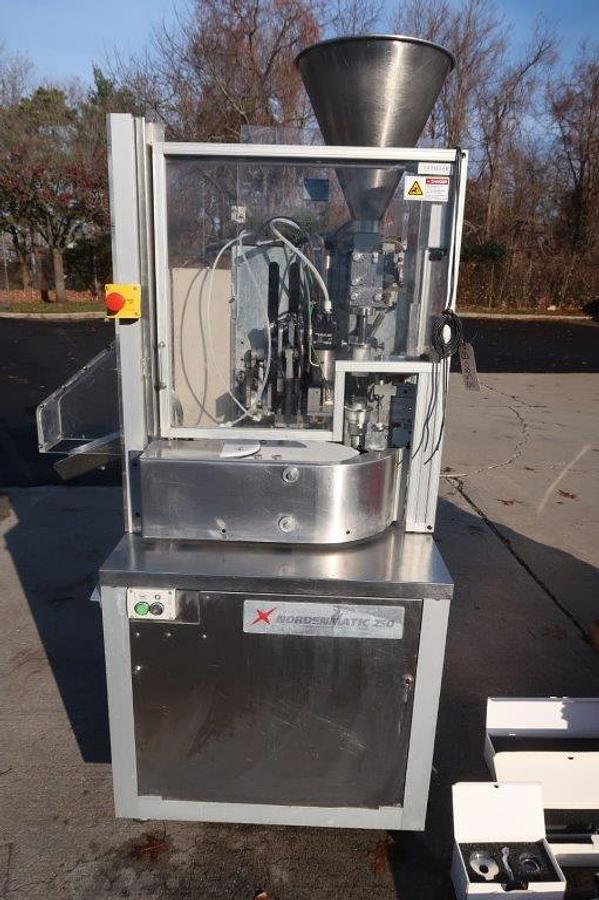 Used Nordenmatic NM250-HA Hot Air Tube Filling And Sealing Machine, Many Change Parts Included