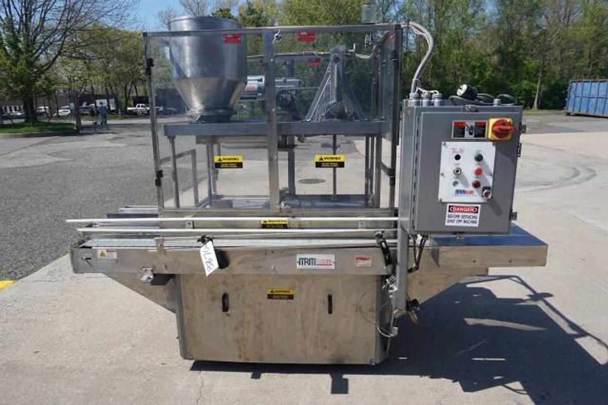 Used MRM/Elgin Twin Head Gallon Piston Filling Machine