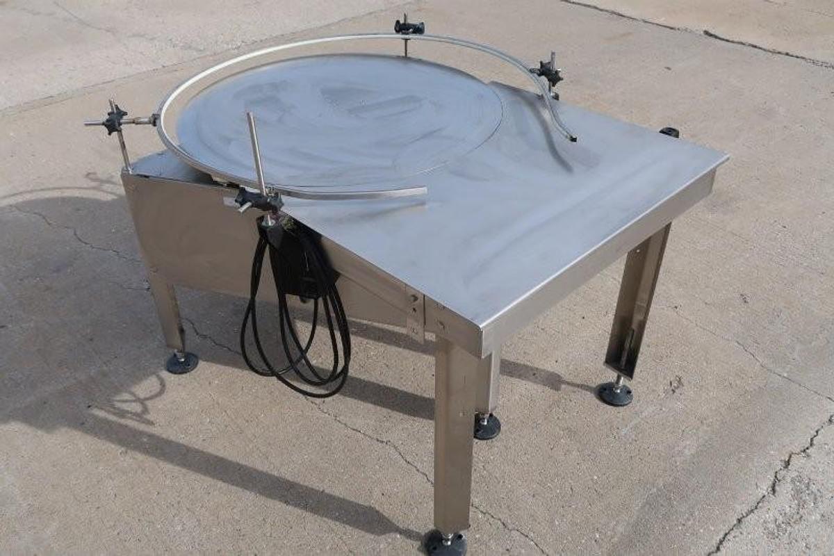 Used Oden 36 In. Diameter Rotary Unscrambling/Accumulating Table, with Shelf