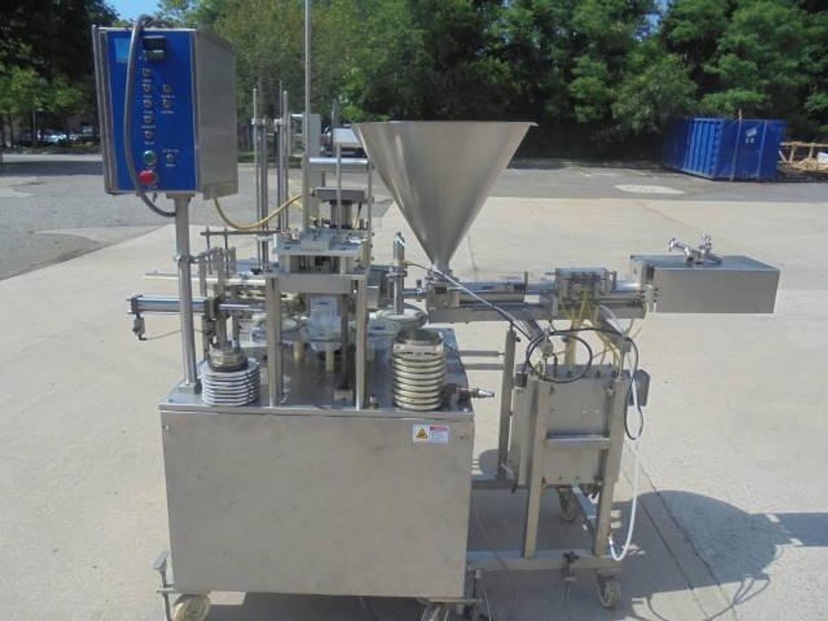 Used Autoprod RO-A3 Rotary Cup Filler/Sealer/Capper, 50 Per Minute