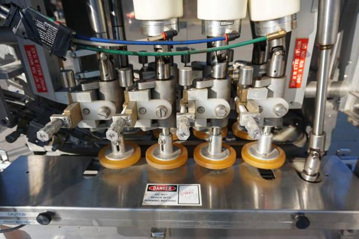 Used Pack-West Auto 200 Eight Spindle Capper, 300 Per Minute