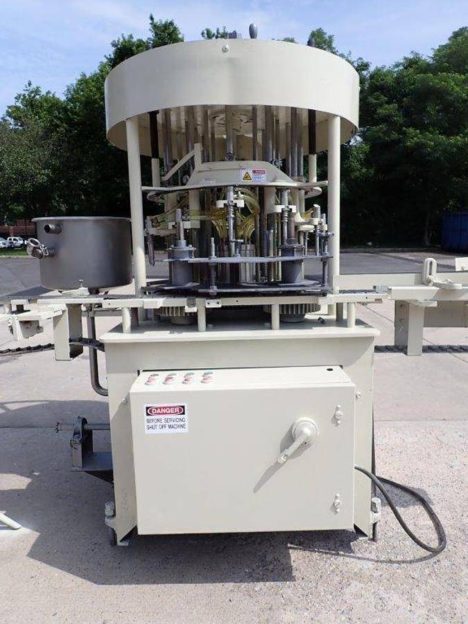 Used New Way 12 Spout Rotary Pressure Gravity Liquid Filling Machine, 8-1/4 In. Centers