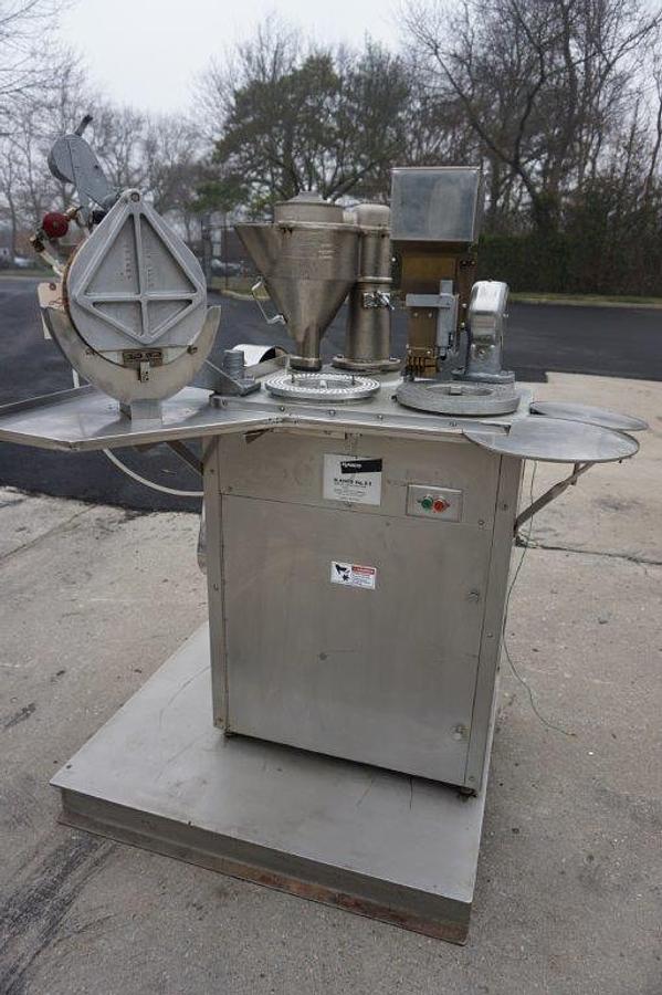 Used Elanco 8S Semi-Automatic Encapsulator, 15,000/Hr.