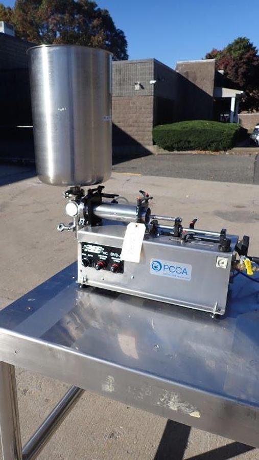 Used REB Tabletop Single Piston Filler, Air Operated