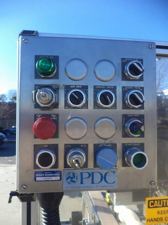Used PDC 65-M Tamper Evident Neck Bander/Sleever, 200 pm
