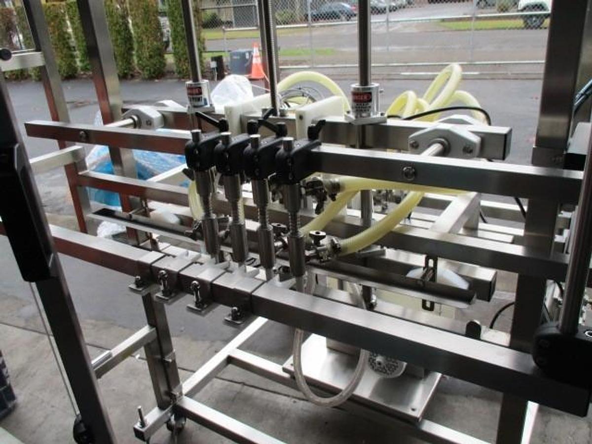 Used Inline Filling Systems Overflow Filling Line, with Capper