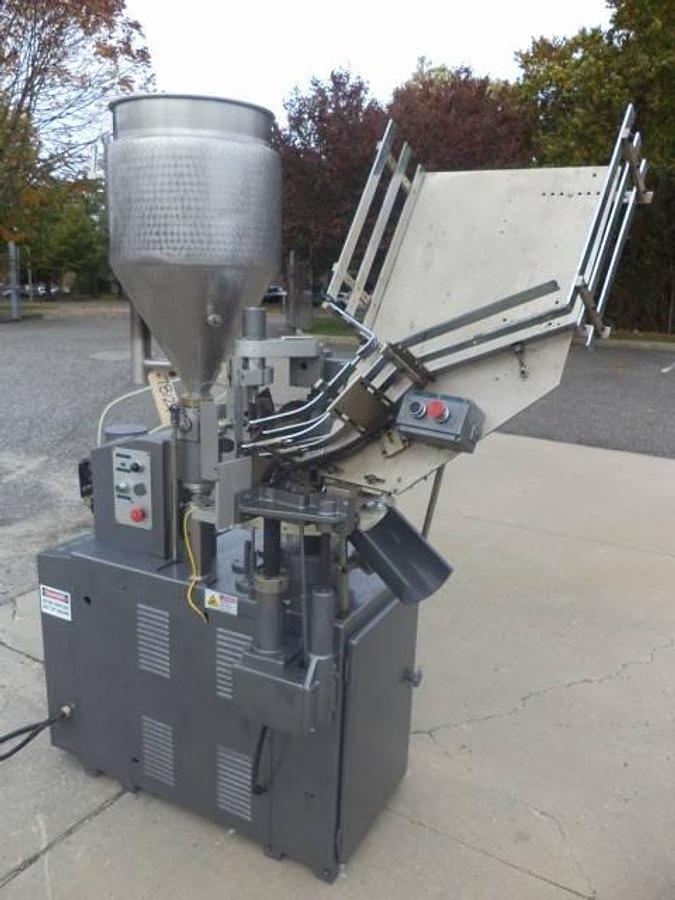Used Comadis automatic plastic radiant heat tube filler