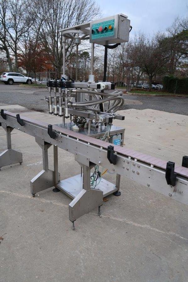Used Inline Filling Systems 4 Spout Overflow Straight Line Liquid Filler, Stainless Steel