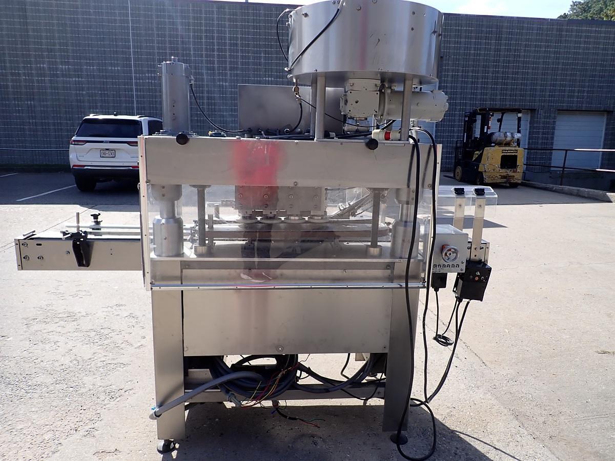 Used Kaps-All Model C Automatic Eight Spindle Capper, 200 Per Minute
