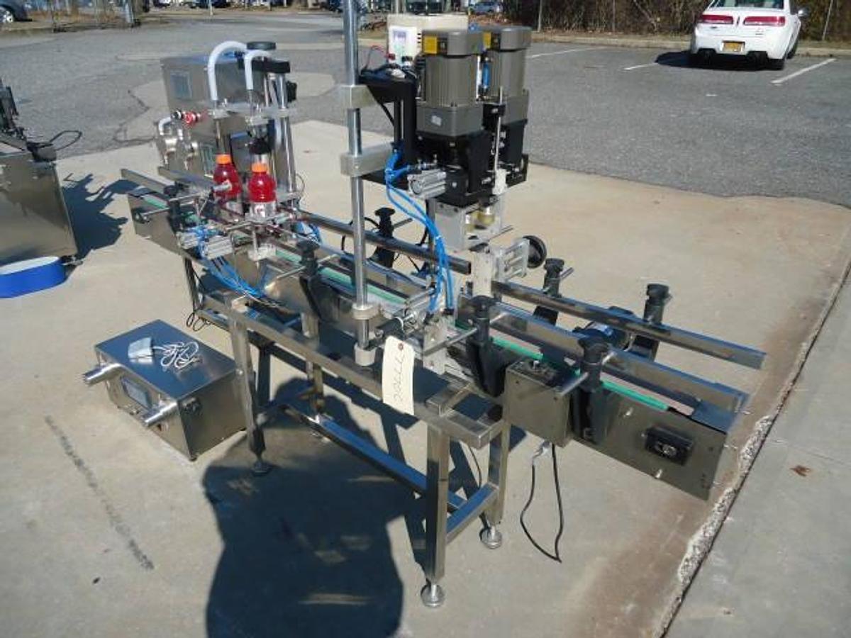 Used Ocean Packing Two Head Pump Style Stainless Steel Filling And Capping Machine