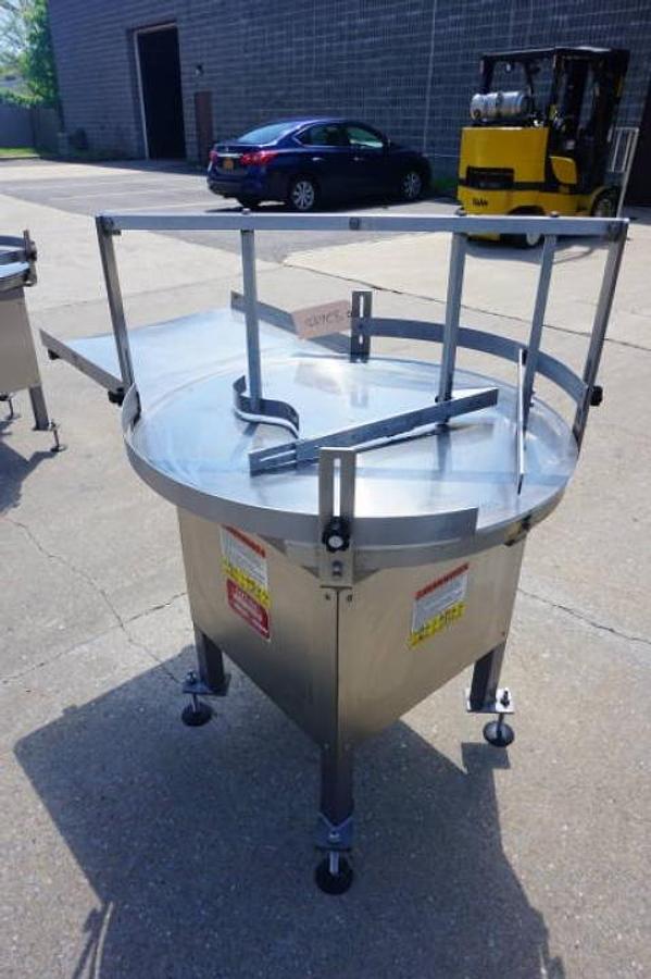 Used 36 In. Kaps-All Stainless Steel Rotary Table, with unscrambling shelf