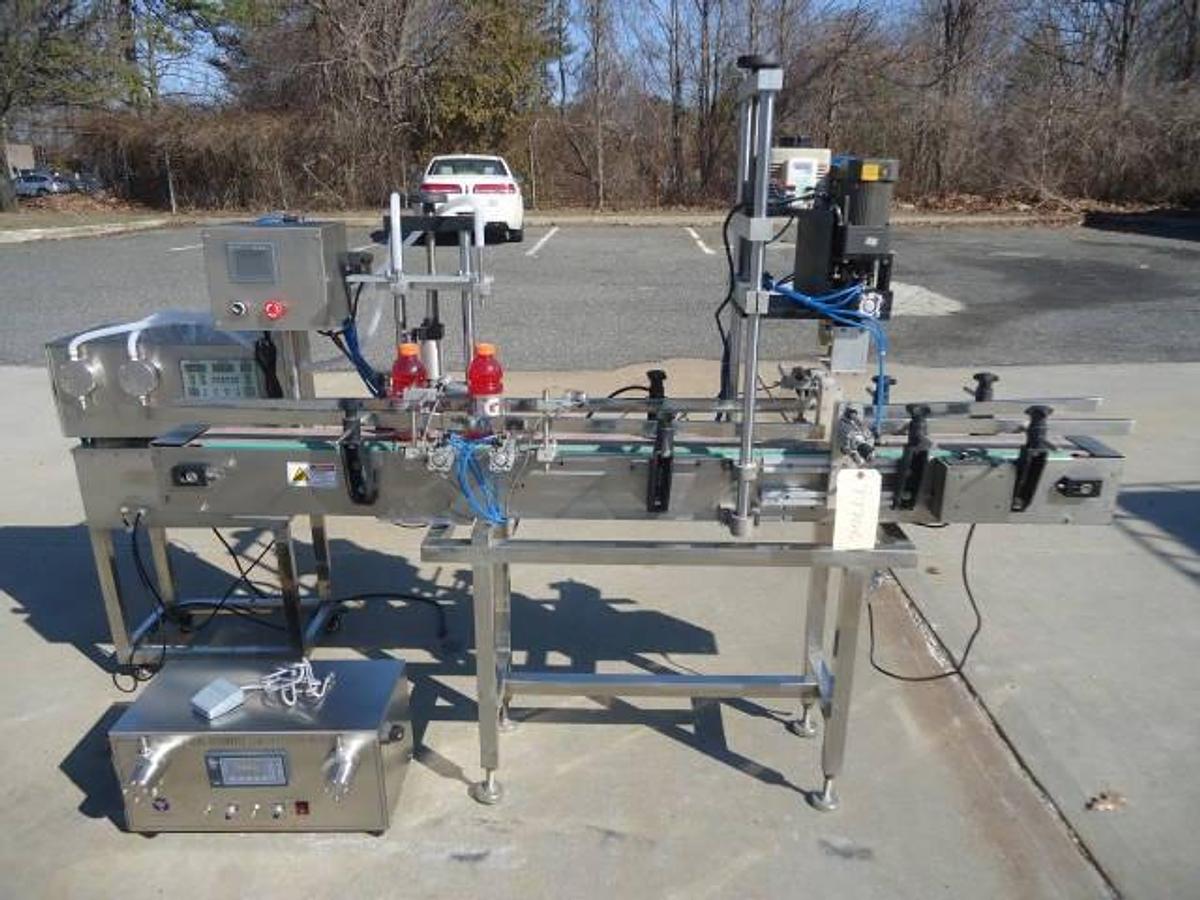 Used Ocean Packing Two Head Pump Style Stainless Steel Filling And Capping Machine