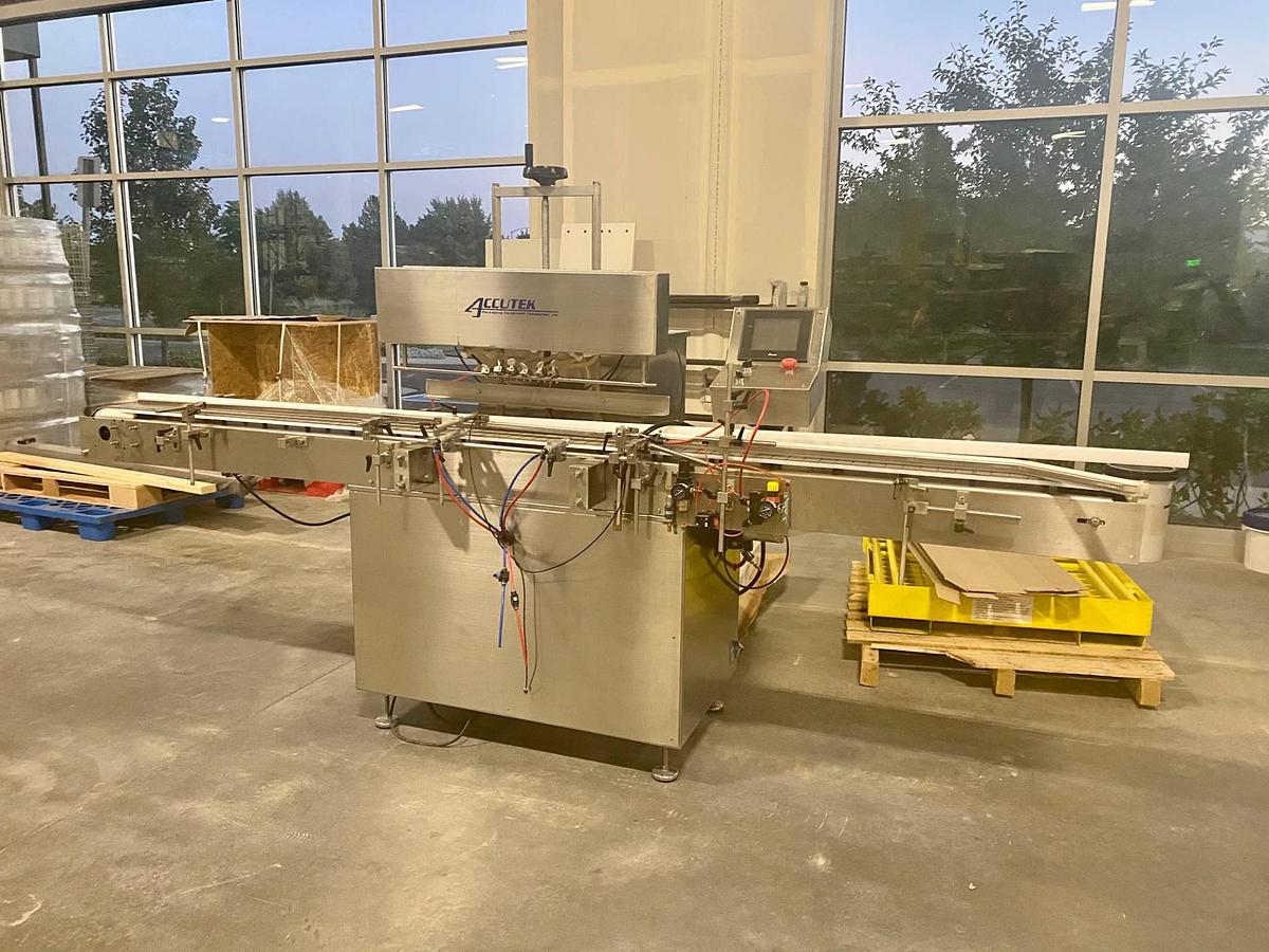 Used ACCUTEK Six Head”Auto Pinch 25″ Liquid Filler