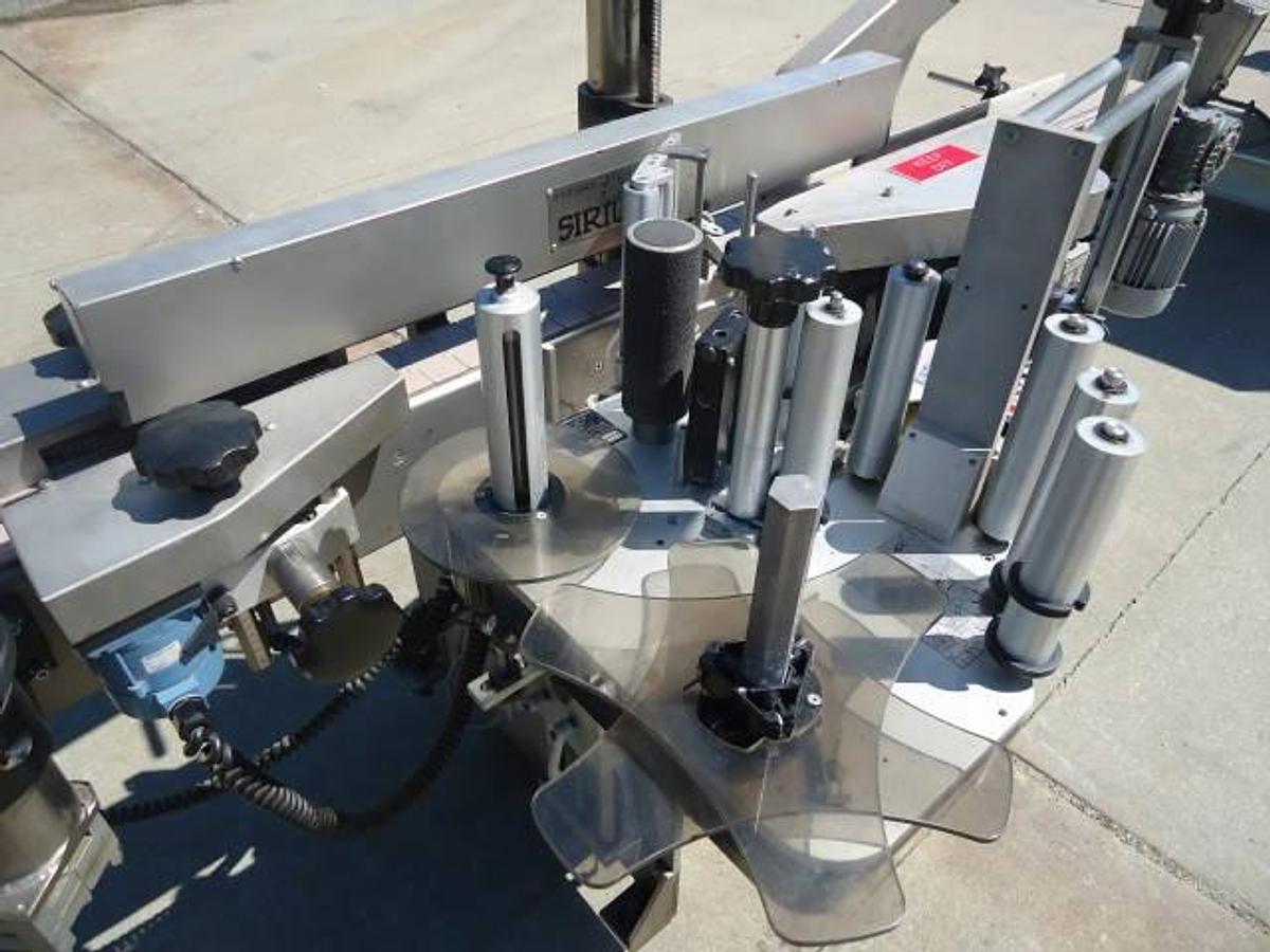 Used Harland “Sirius” Spot/Wrap Around Labeler With Coder