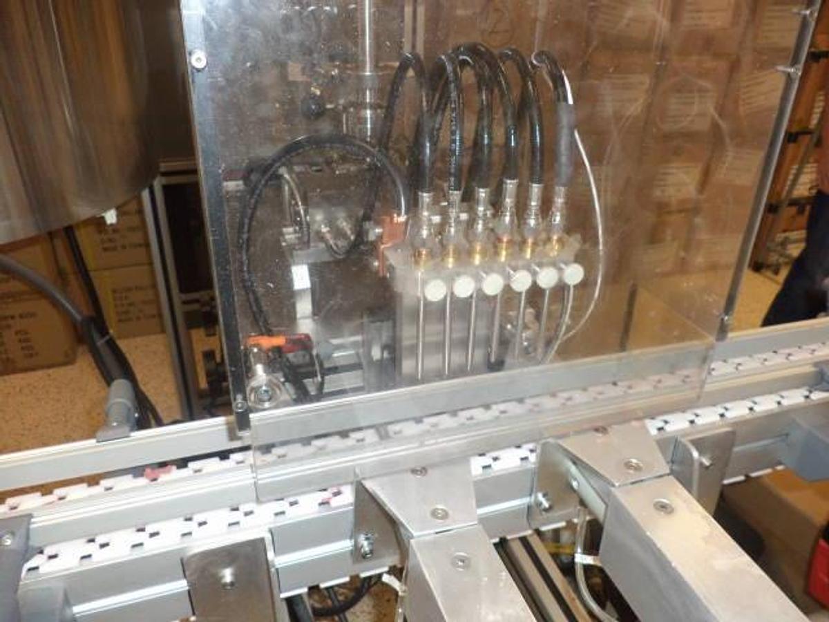 Used Cavalla Six Piston Hot Filling System With Conveyor & Capper