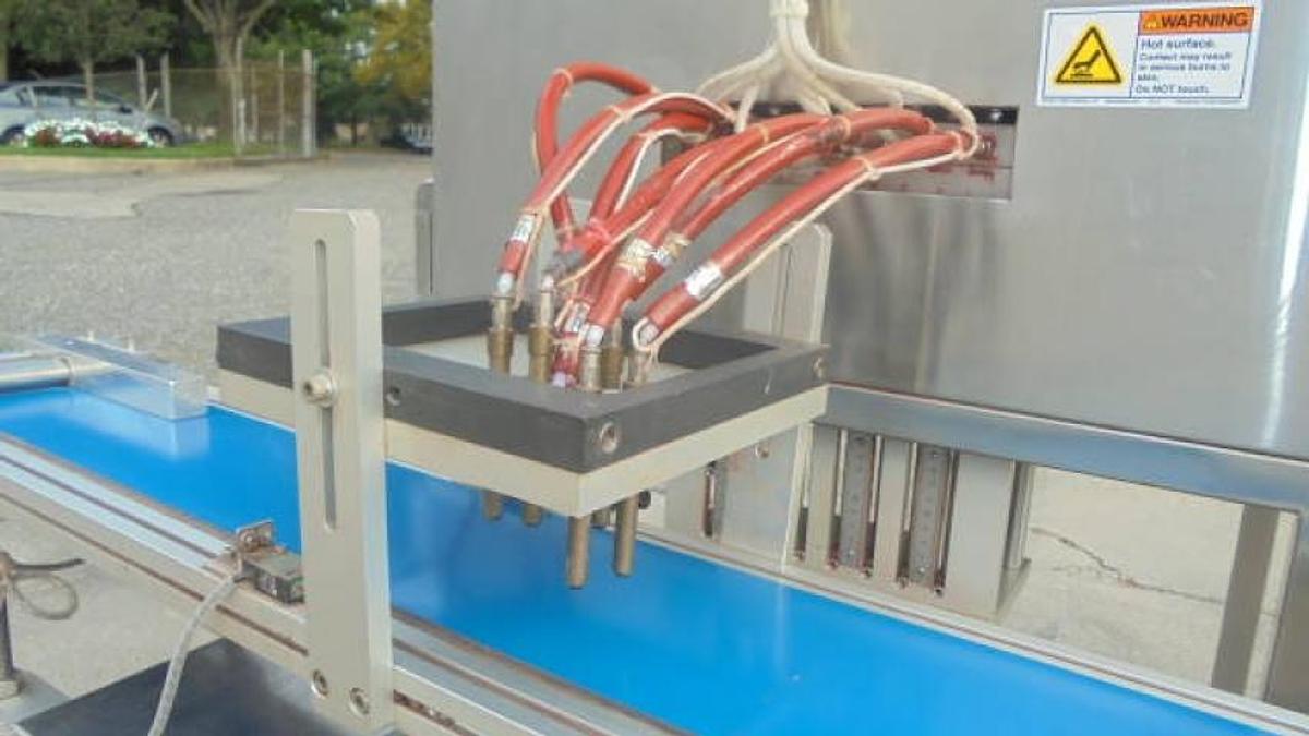 Used 8-Head Automatic Piston Filler for Hot Filling