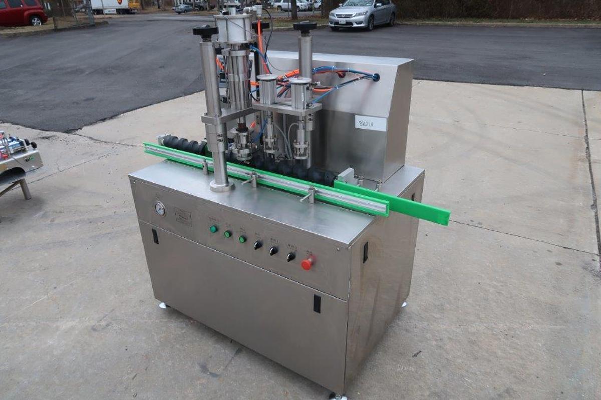 Used JRSEA Two Head Aerosol Filling Machine with Crimping Head
