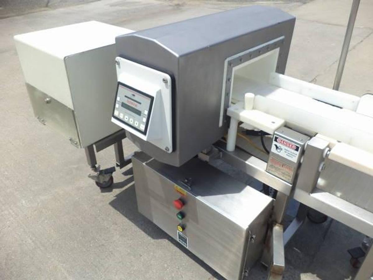 Used Safeline conveyorized metal detector, stainless steel