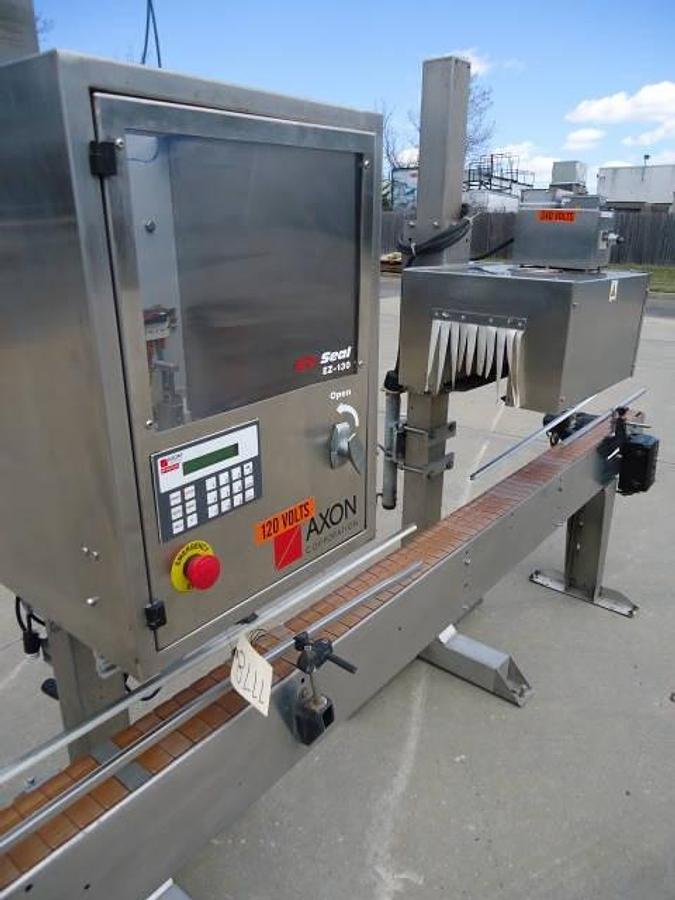 Used Axon Ez-130 Automatic Sleever/Neck Bander With Tunnel