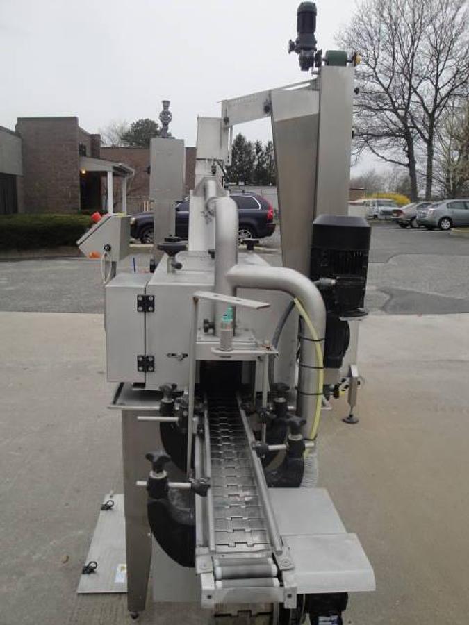 Used Emerito 2.8 Automatic Twist-Off Steam Capping Machine, Stainless Steel