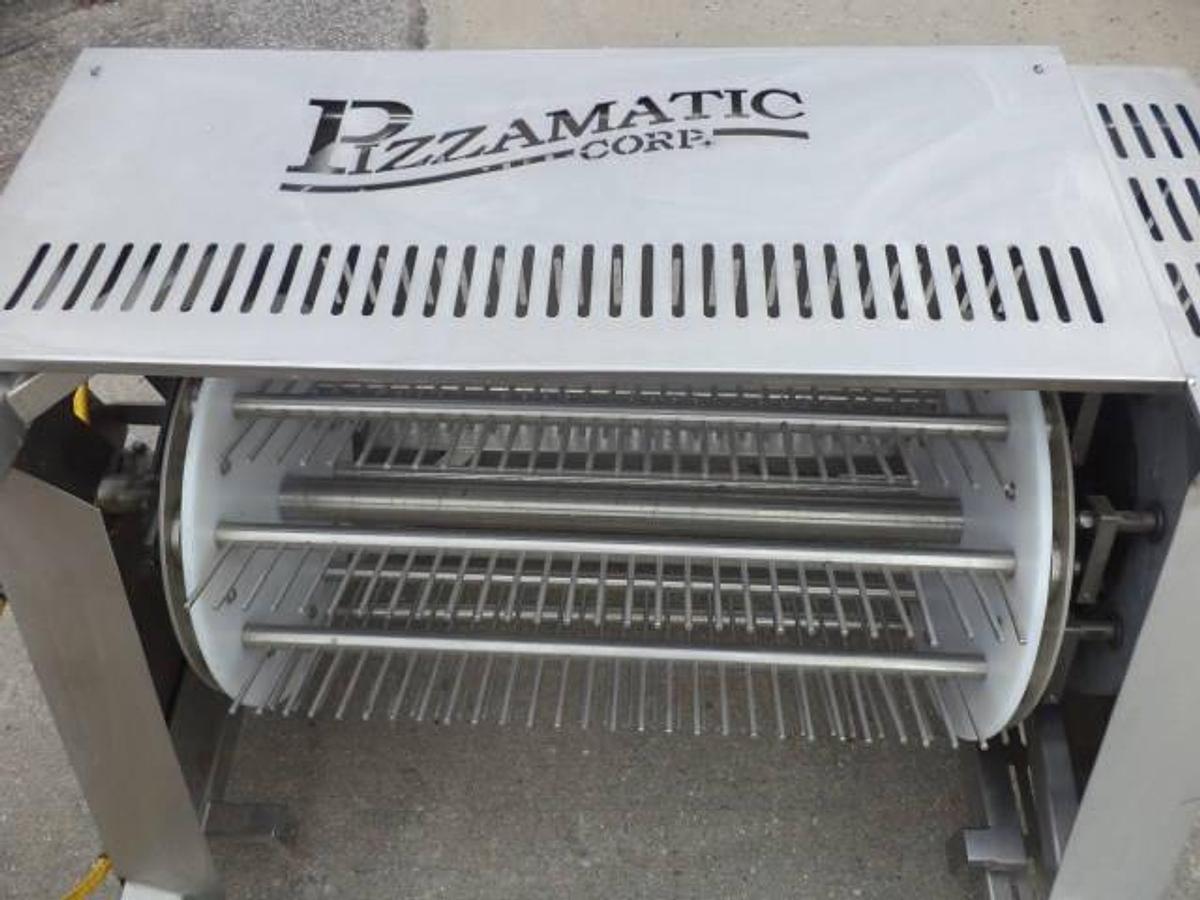 Used Pizzamatic “waterfall”” topping applicator for cheese”