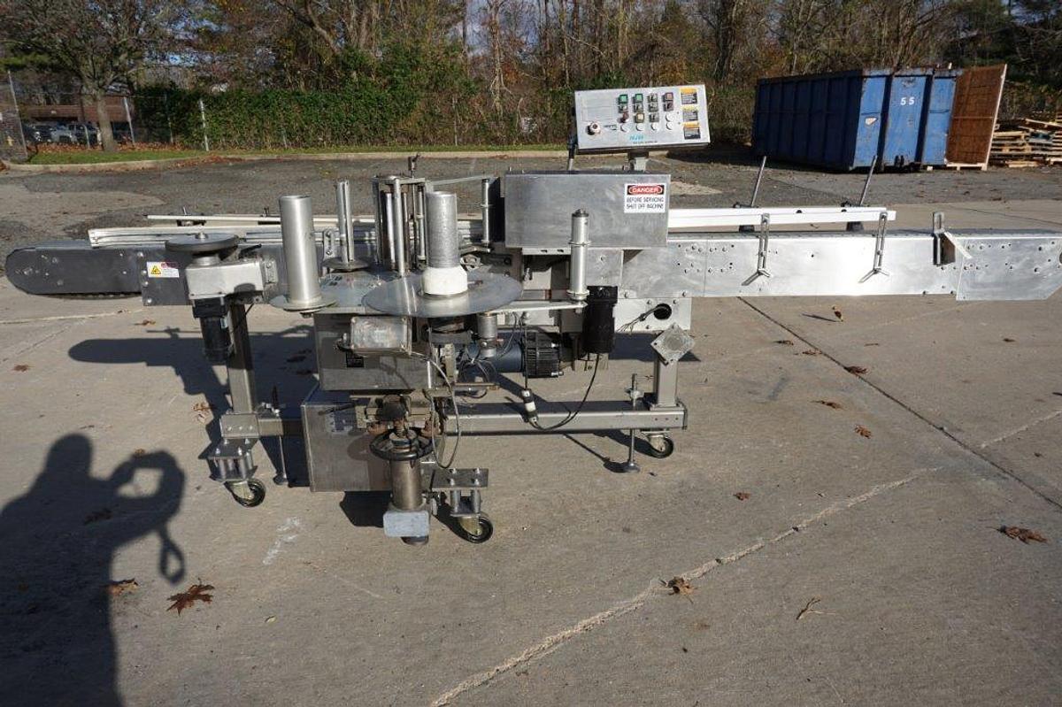 Used NJM  Auto Colt II Pressure Sensitive Spot/Wrap Around Labeling Machine