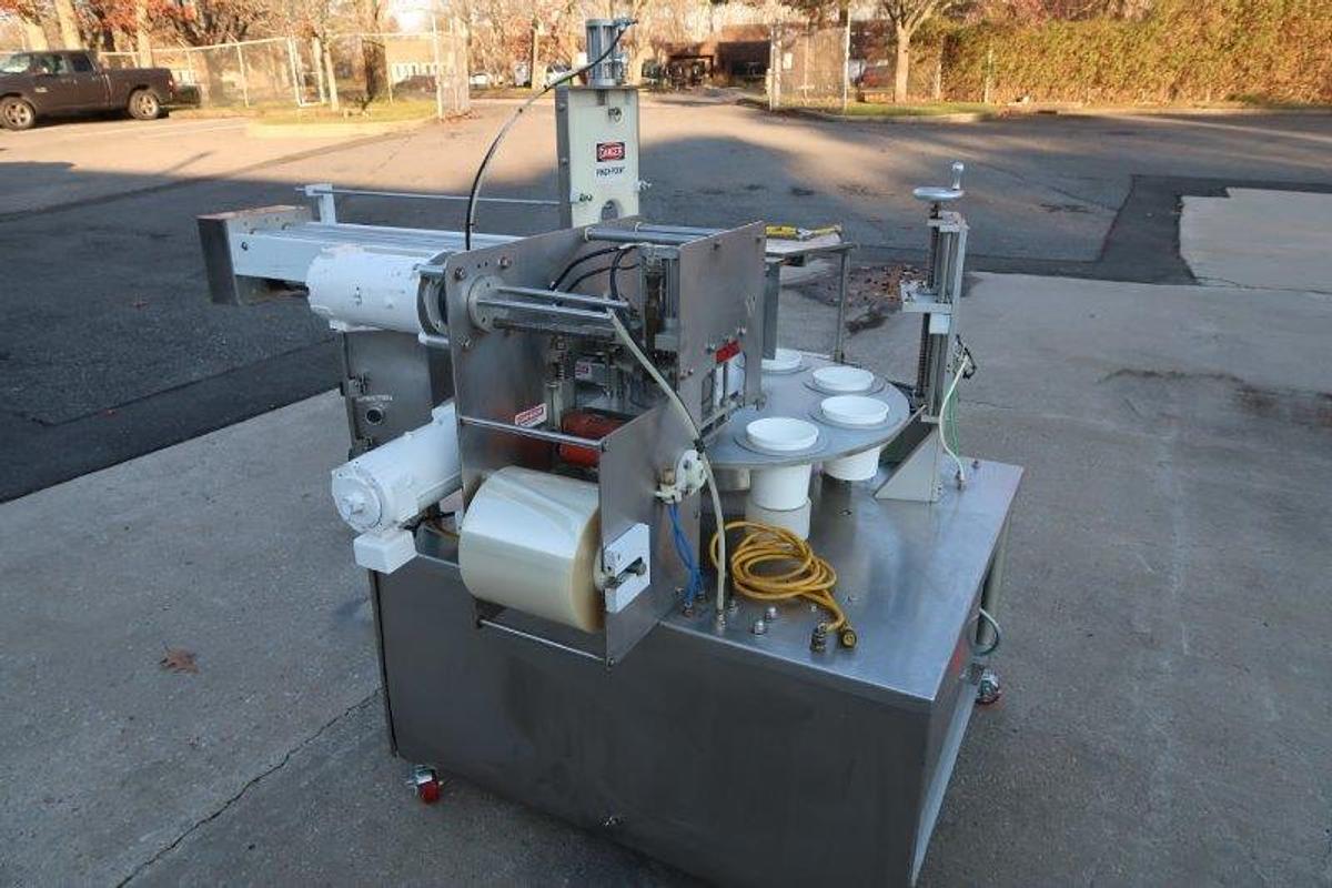 Used World Cup 8-80 Cup Packaging Machine, 4-7/8 In. Diameter Cups
