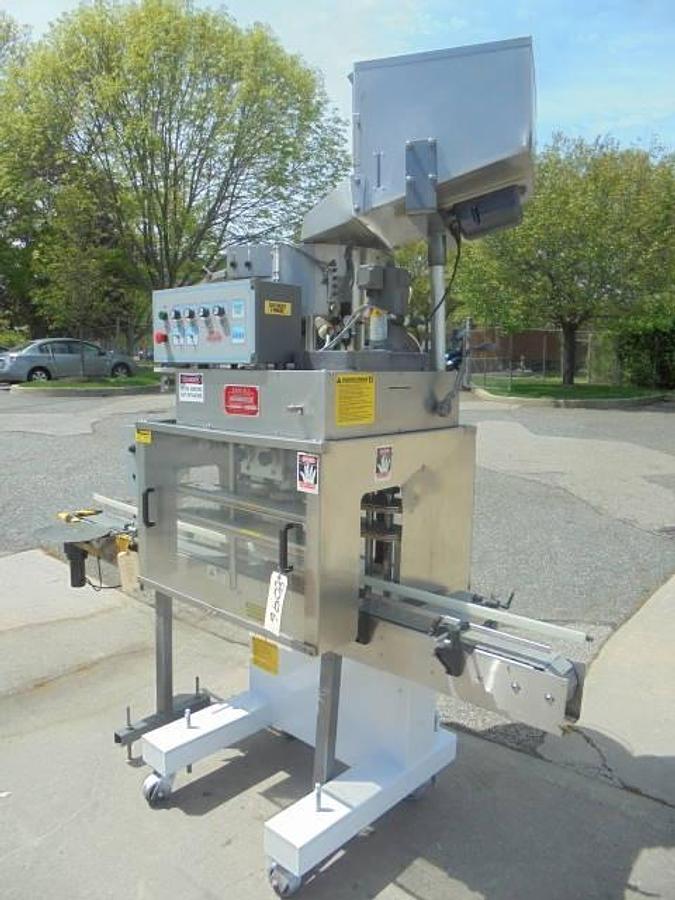 Used Kaps All E4 Four Spindle Automatic Screw Capper, 80 Per Minute