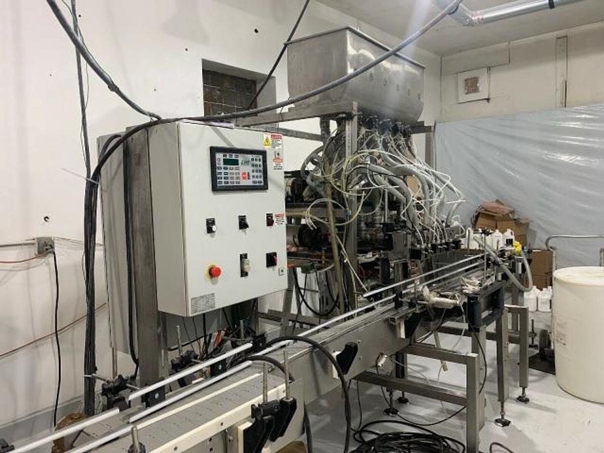 Used E-Pak Six Head Fully Automatic Pump Style Positive Displacement Filling Machine
