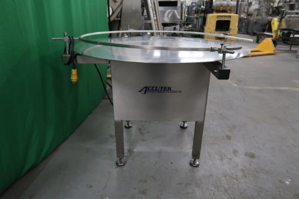 Used 48 In. Diameter Accutek Stainless Rotary Unscrambling/ Accumulating Table, Variable Speed