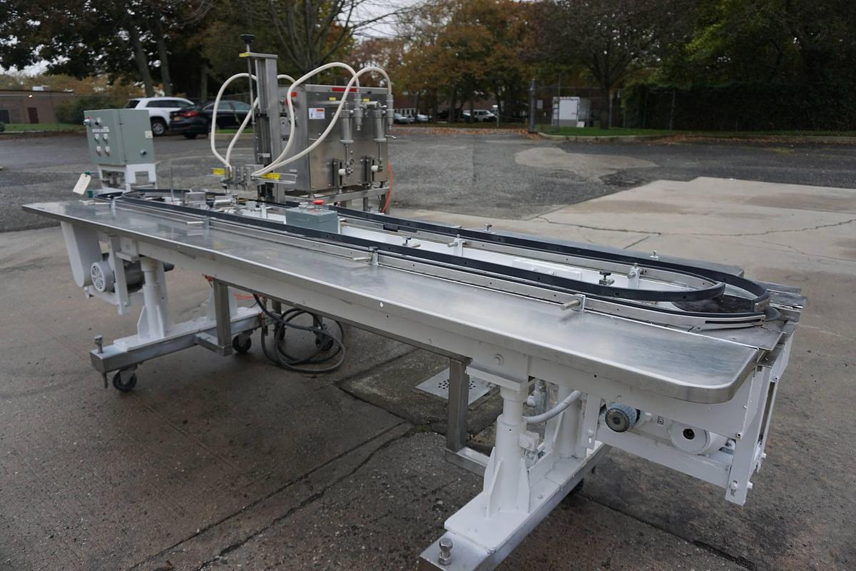 Used Filling Equipment Company Four Head Piston Filler with Carousel Conveyor