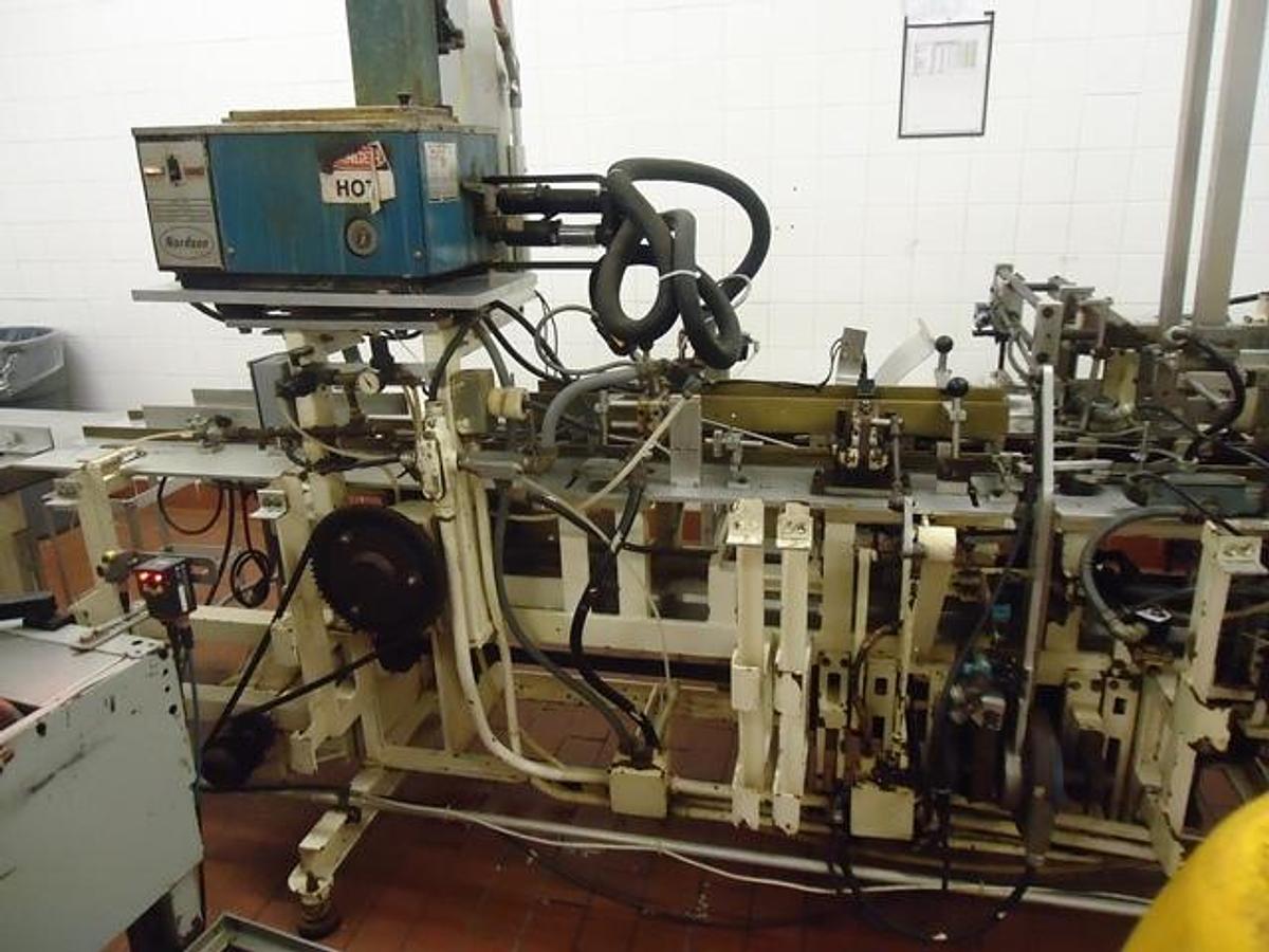 Used Bartelt IM-6 Horizontal Pouch Packager With Hot Melt Cartoner