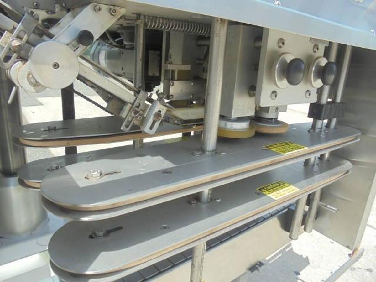 Used Kaps All E4 Four Spindle Automatic Screw Capper, 80 Per Minute