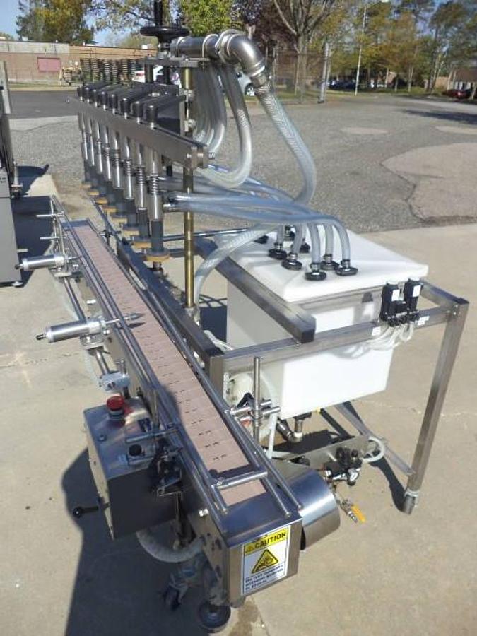 Used Packaging Dynamics Eight Spout Stainless Steel Portable Straight Line Liquid Filler, Explosion Proof