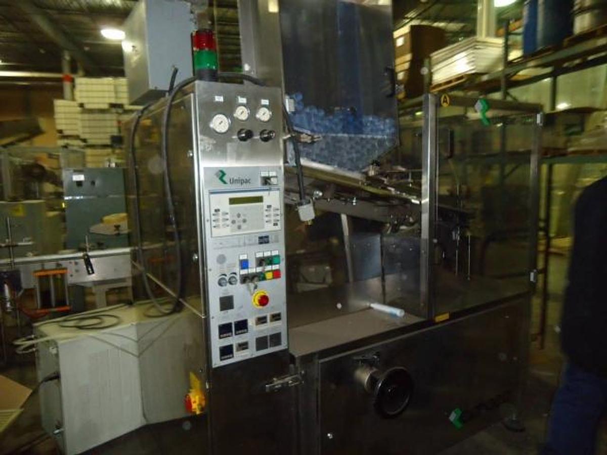 Used Unipac 120 Automatic Plastic Tube Filling/Sealing Machine