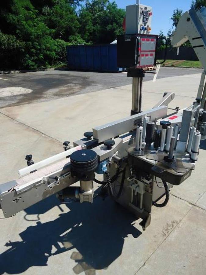 Used Harland “Sirius” Spot/Wrap Around Labeler With Coder