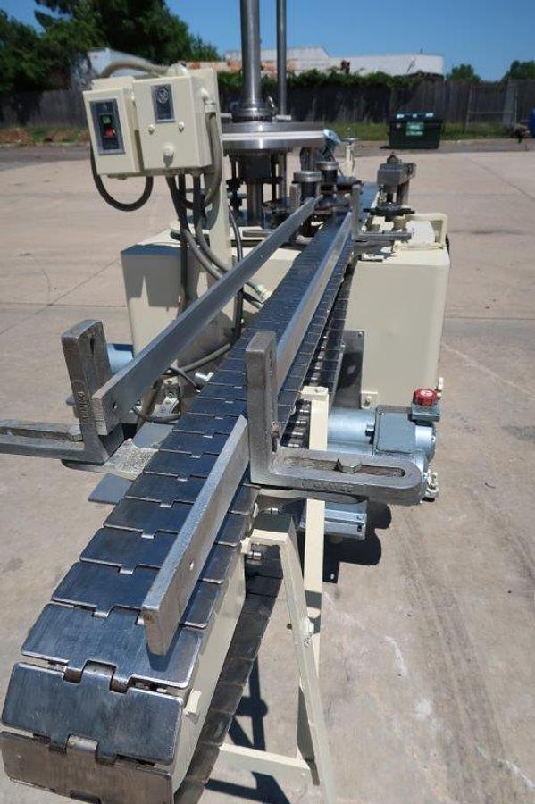 Used MRM “Versa-Fil” Six Head Rotary Time and Pressure Positive Displacement Filling Machine, with Waukesha Pump