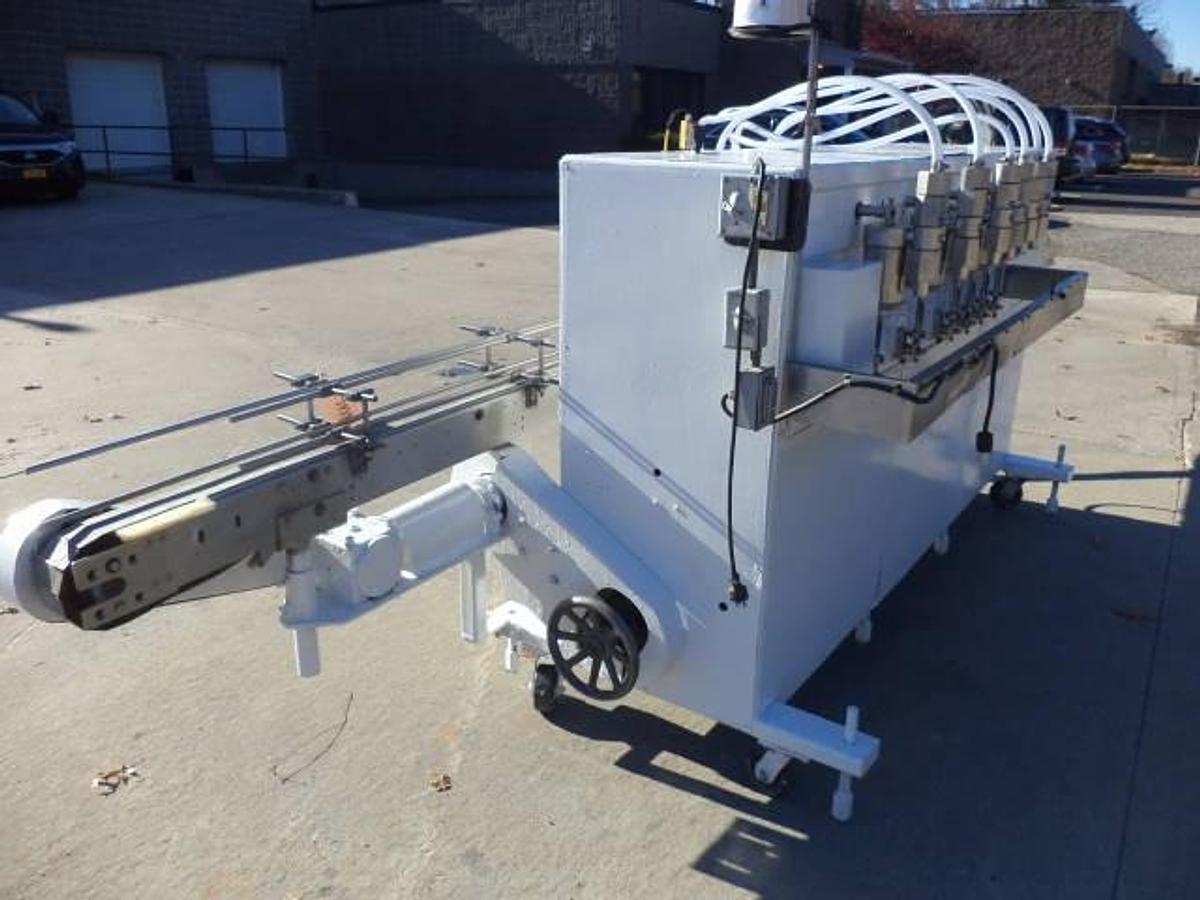 Used Filamatic Eight Piston Automatic Filling Machine, 520 cc Pistons