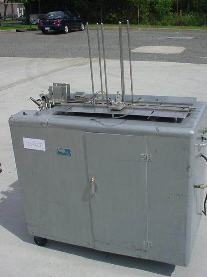 Used Bivans 50 “Tuck-0-Mat” Cartoner, Portable