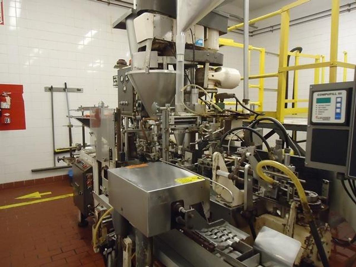 Used Bartelt IM-6 Horizontal Pouch Packager With Hot Melt Cartoner